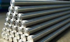 Stainless steel round bars stacked industrial metal rods