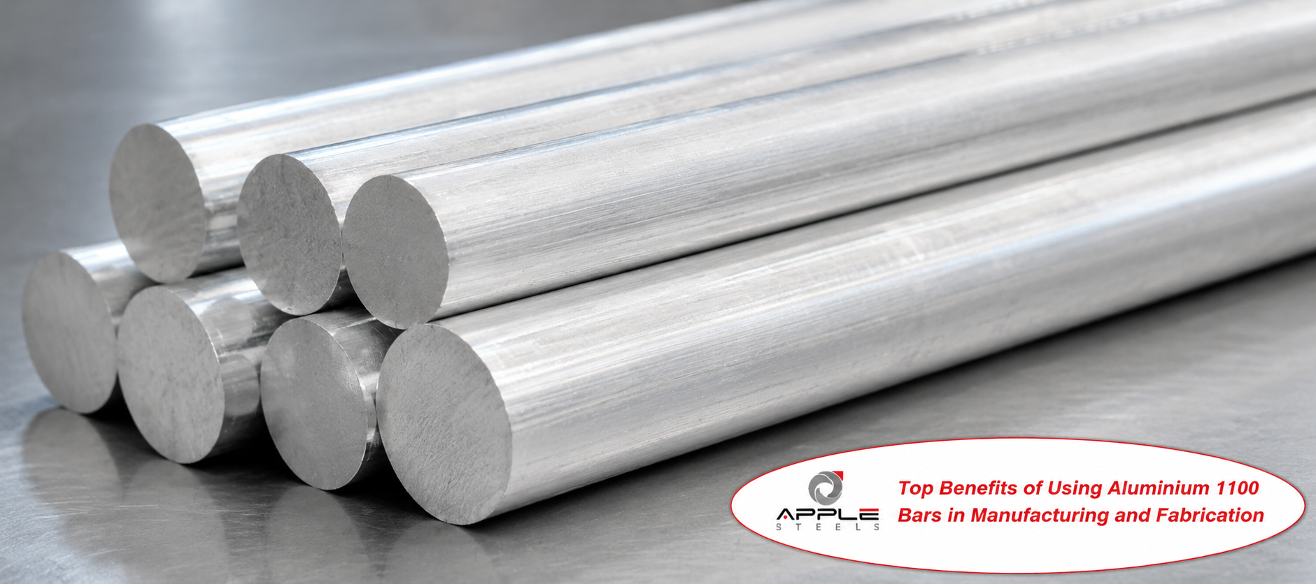 Aluminium 1100 round bars stacked on a metal surface for industrial manufacturing and fabrication applications.